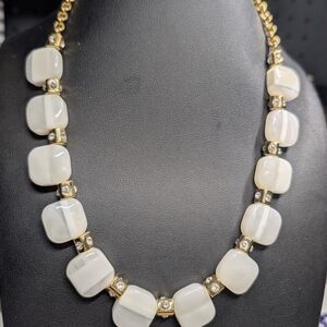 Elegant Gold and White Necklace